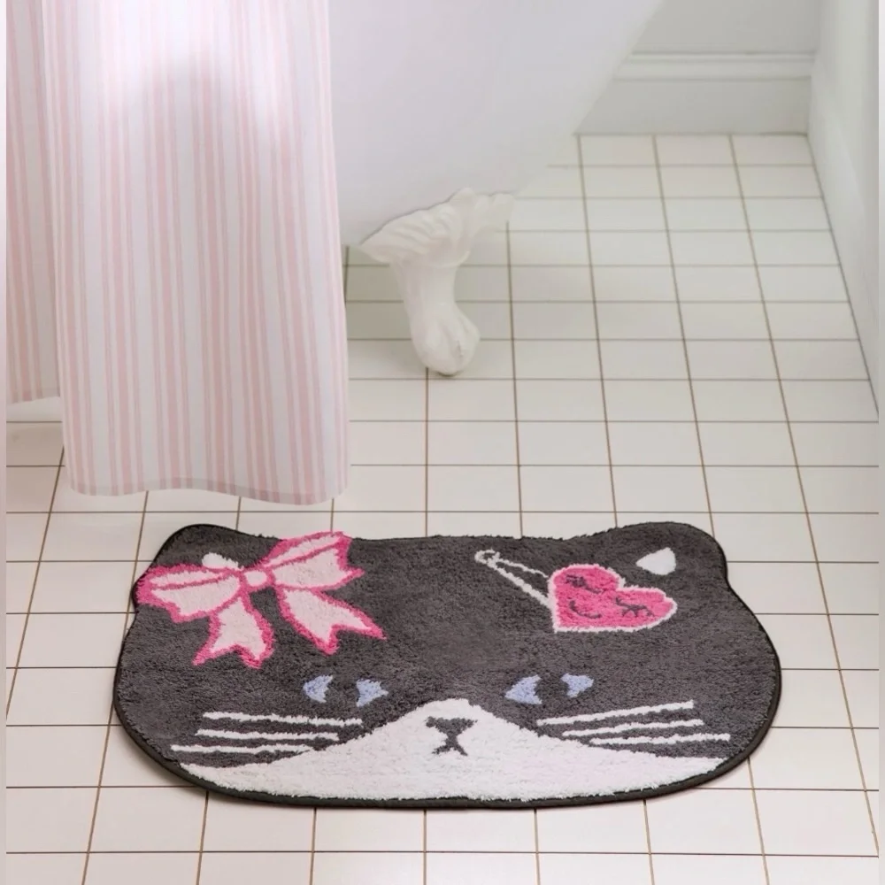 UO Sassy Cat Bow and Barrette Bath Rug